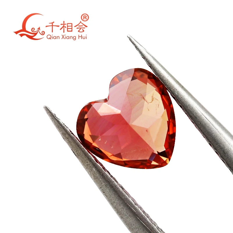 

Heart cut lab grown Sapphire Padmaraga more red orange Color Natural Cut including Minor Cracks Inclusions Corundum Loose Stone