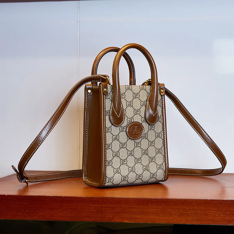 

Mobile phone bag crossbody small bag 2026 new design monogram mini tote bag vintage violin sheet music bag fashion shoulder bag