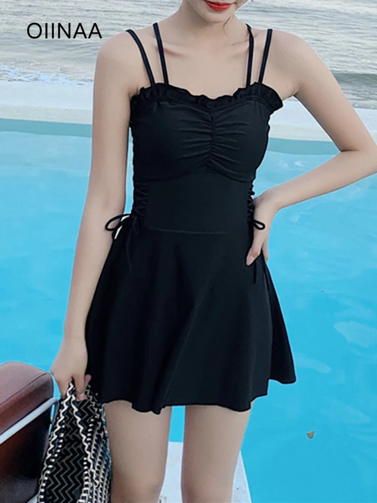 

OIINAA цельный купальник женский Холтер с рюшами пляжное платье модный праздник горячий весенний купальник лето 2025 сексуальный черный боди