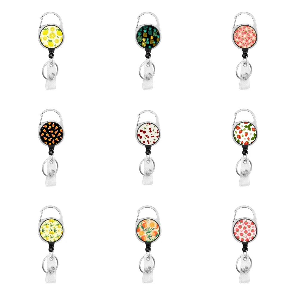 Hot selling circular Beautiful fruits pattern Easy disassemble Zinc alloy badge automatic scroll easy pull buckle keychain H1206