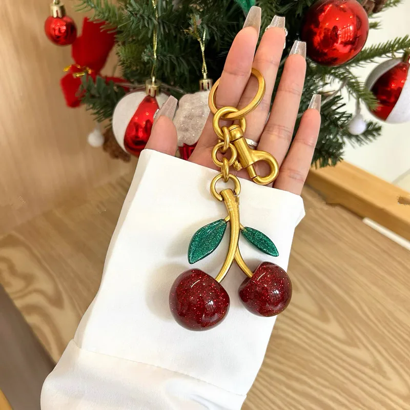 

Bag Charm Green Leaf Crystal Cherry Pendant Decoration For Coach Handbag Shoulder Bag Exquisite Keychain Attachment Part