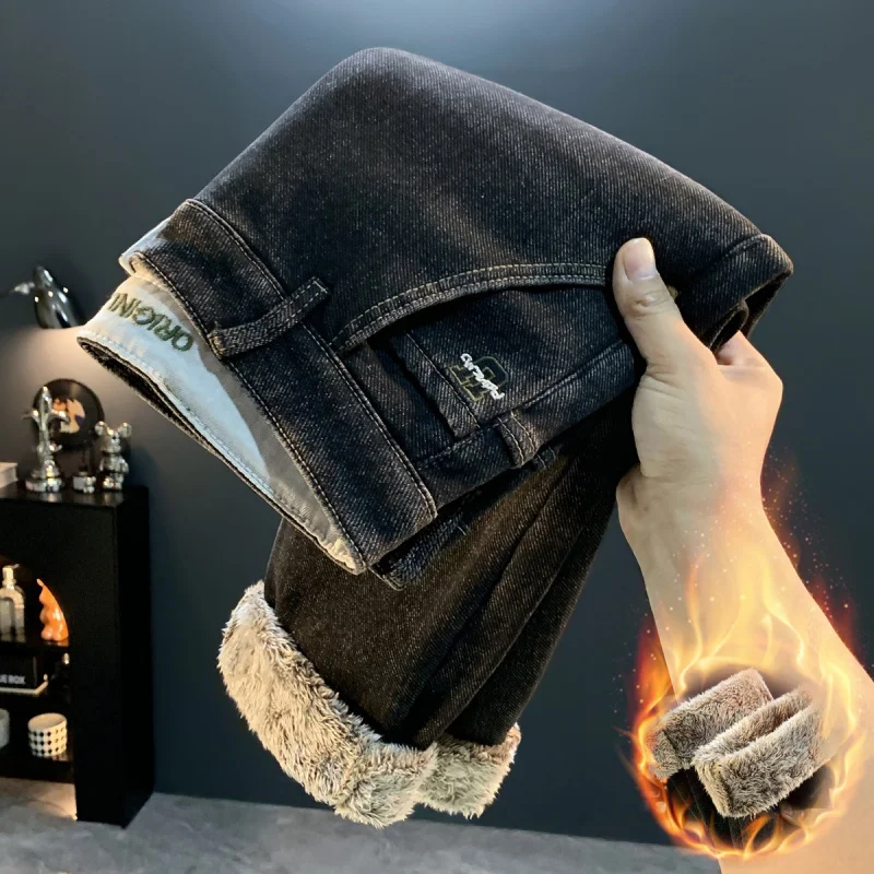 High end velvet thickened jeans men's winter new slim fit small leg pants, cold resistant and warm casual men's pants