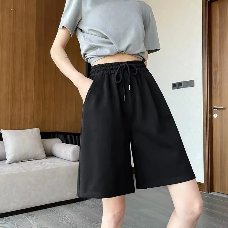 شورت رياضي قطني بلون سادة للنساء سروال رفيع بخمس نقاط للجري فضفاض واسع الساق مقاس كبير