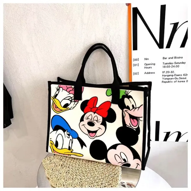 Disney New Minnie Fashion Cartoon Canvas o dużej pojemności damska torba na ramię dojazdy do pracy na co dzień wszechstronna torba typu Tote