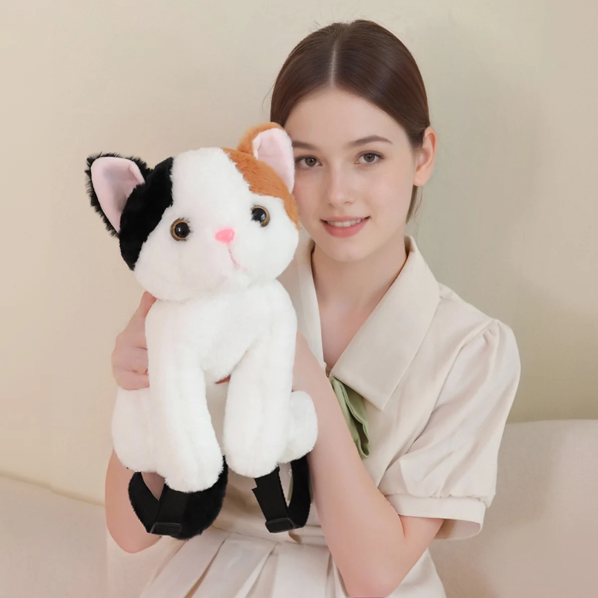 A lovely soft and cute simulated tricolor cat backpack, a creative cat double shoulder bag with adjustable straps, a party birth