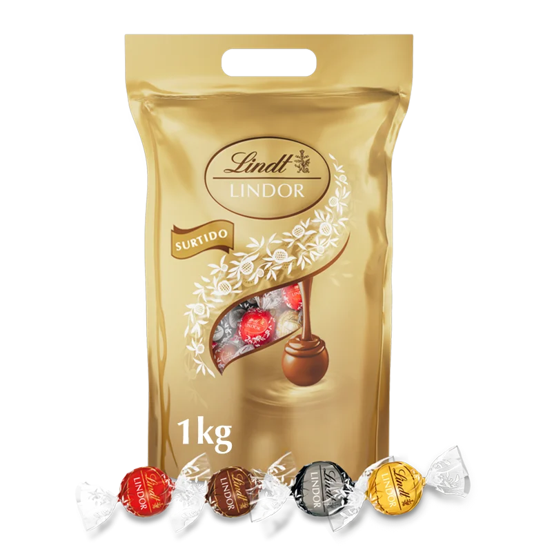 LINDOR Maxi Bag Surtida 1Kg Deliciosos bombones surtidos con cremoso de chocolate: con leche, 60% de cacao y blanco. Esta bolsa de bombones es perfecta para los que no quieren renunciar a la variedad de los bombones Lindor de siempre.Sabor de confianza