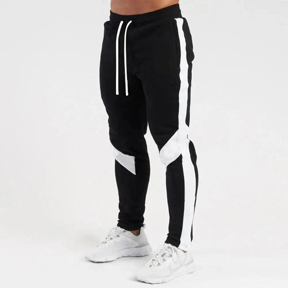 Calça esportiva com emenda de elásticos micro masculina, marca da moda, monocromática, nova moda casual, primavera e outono, 2023