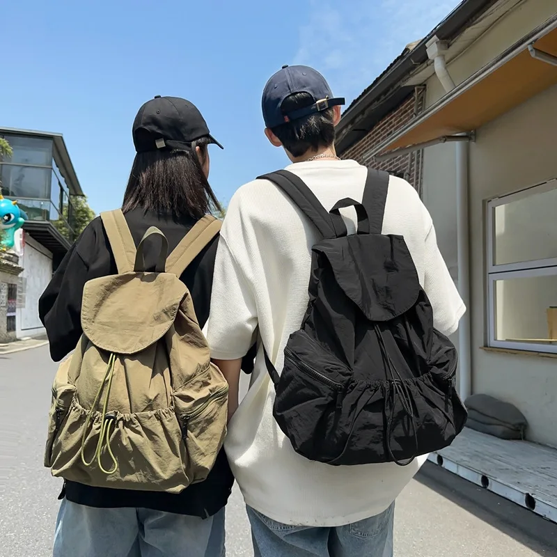 2026 New Pleated Drawstring Nylon Backpack Women's Niche Trend Large Capacity Flip School Bag Backpack for Girls