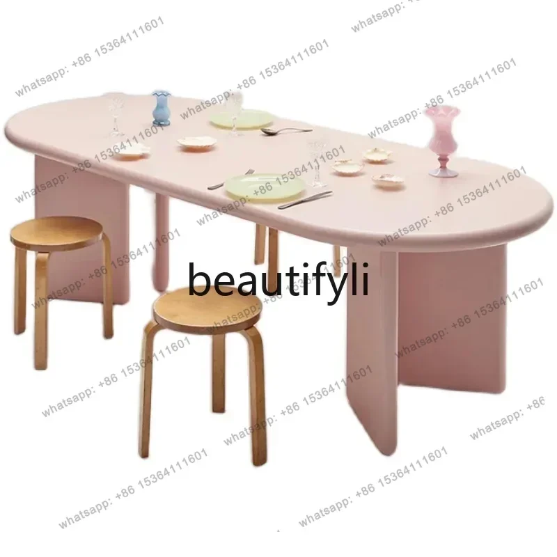 

Nordic solid wood dining table oval household small apartment dining table modern simple rectangular table