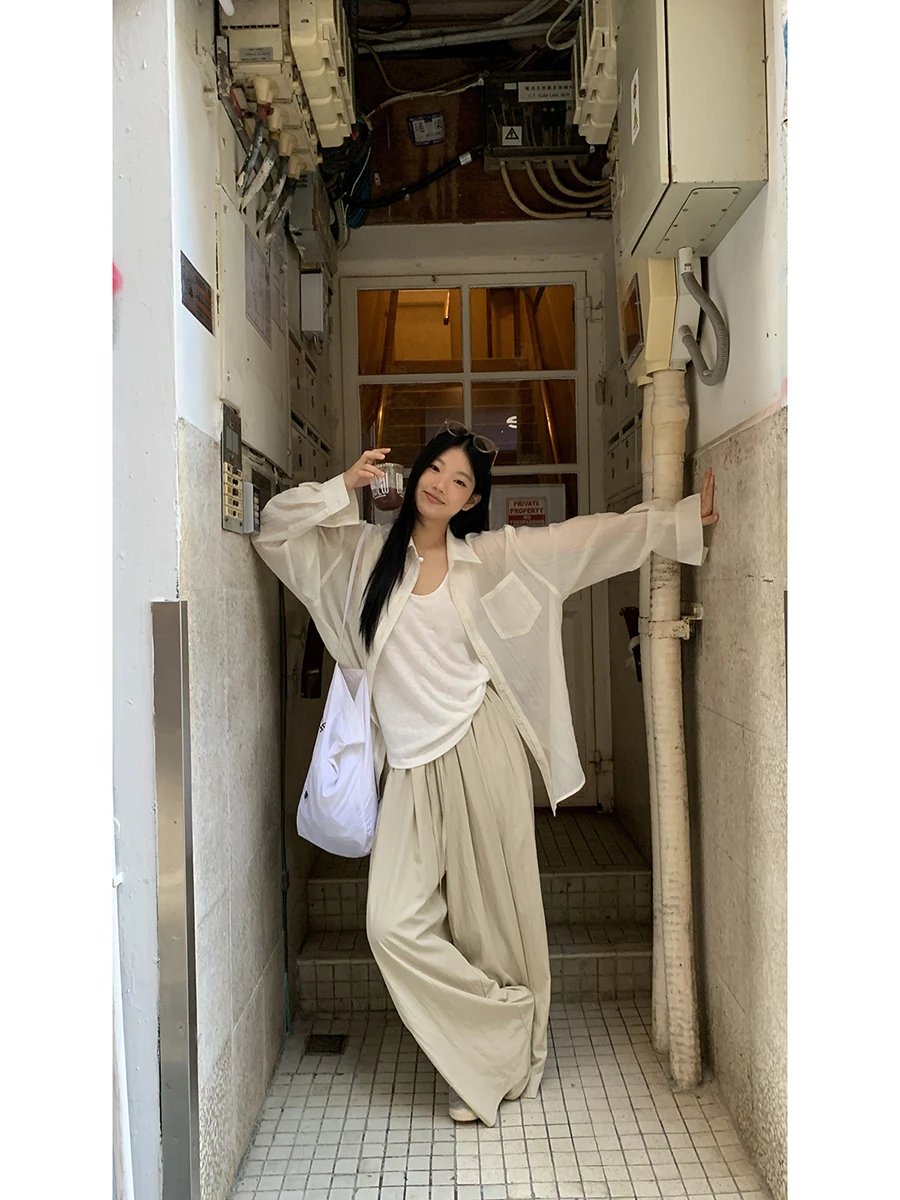 قميص نسائي فضفاض بأكمام طويلة للحماية من الشمس، تصميم أنيق لصيف 2025، ياقة بولو بأزرار، قماش رقيق