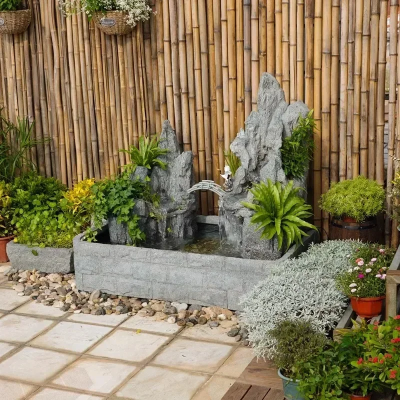 Garden rockery flowing water outdoor stone powder fish pond landscaping living room water circulation feng shui wheel ornament