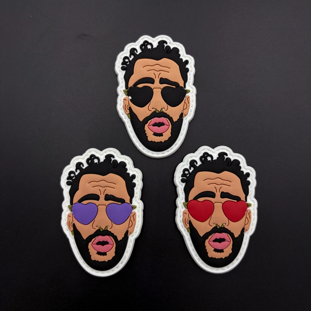 Trendy and cool men's portrait design with sunglasses, unique shape patch made of 2D flat PVC material, available in three different styles, 1 piece optional, with glow-in-the-dark effect, suitable for decorating armbands, bags, and clothing. Comes with a matching matte surface badge sticker