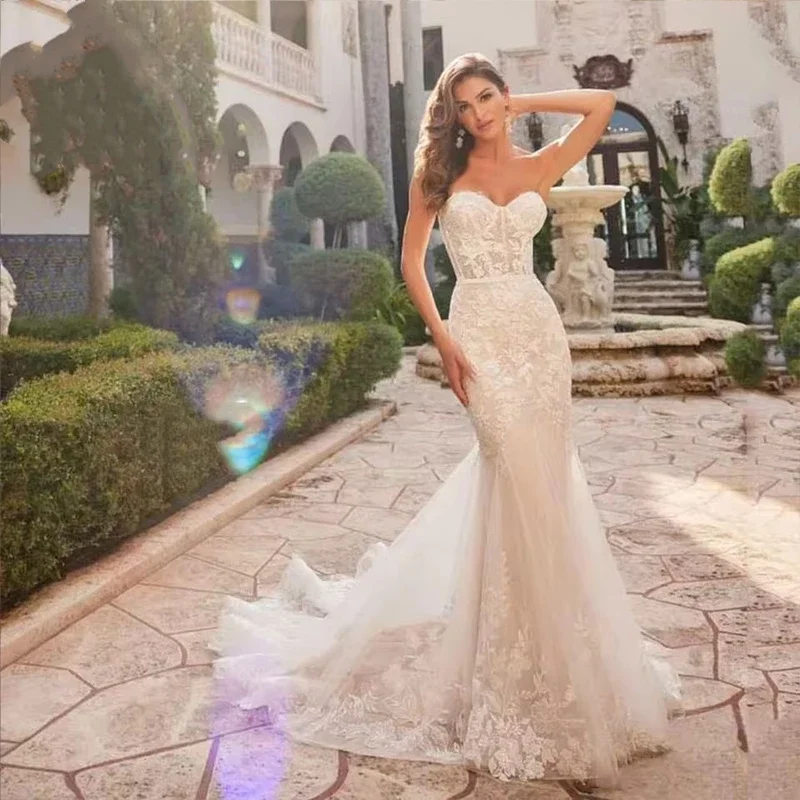 Abiti da sposa personalizzati Sixy a sirena Abiti da sposa senza maniche con applicazioni in pizzo Abiti da sposa con scollo a cuore Abiti da sposa