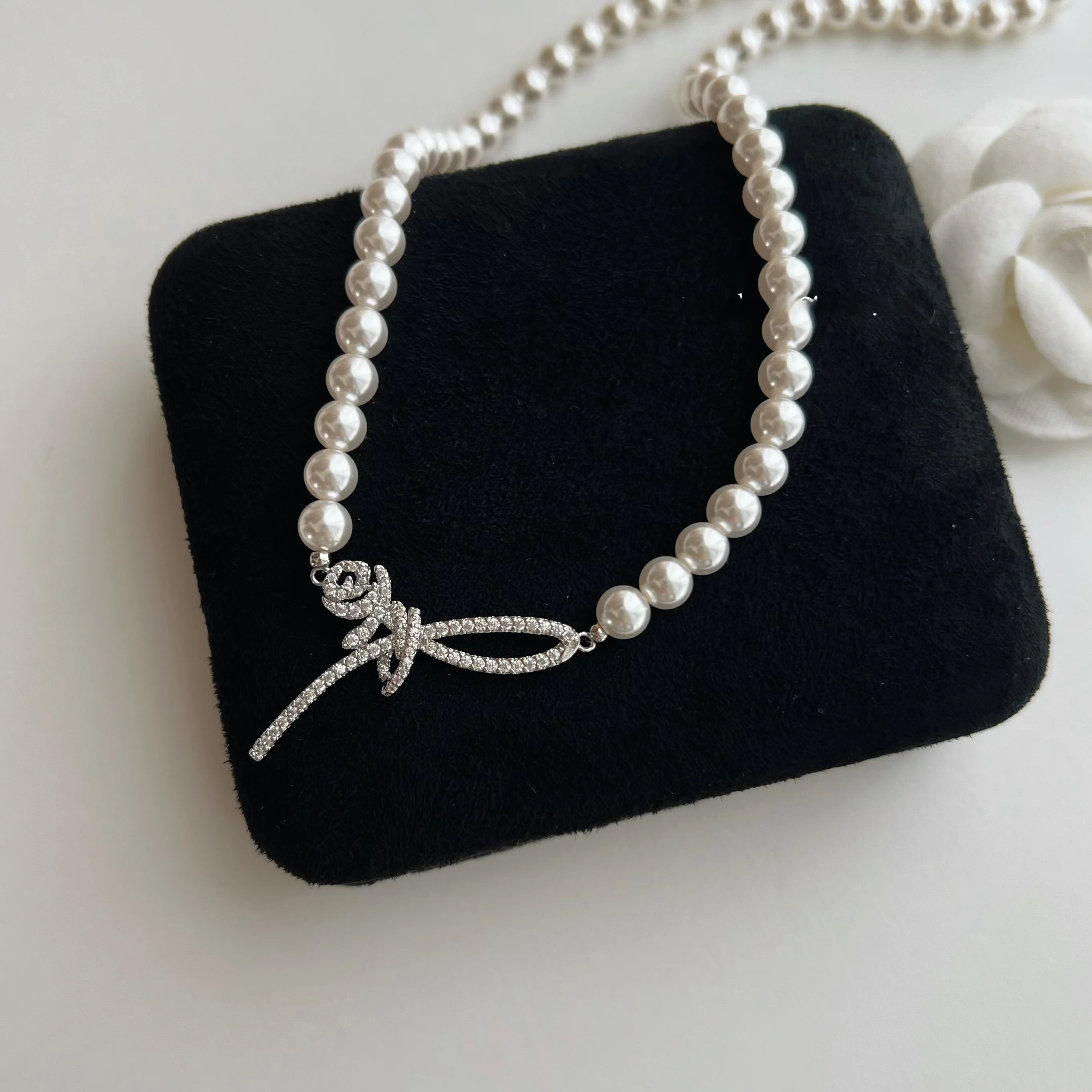 collier-ajustable-en-nacre-avec-nœud-rose-elegant-style-lahabanagirl-pour-femme