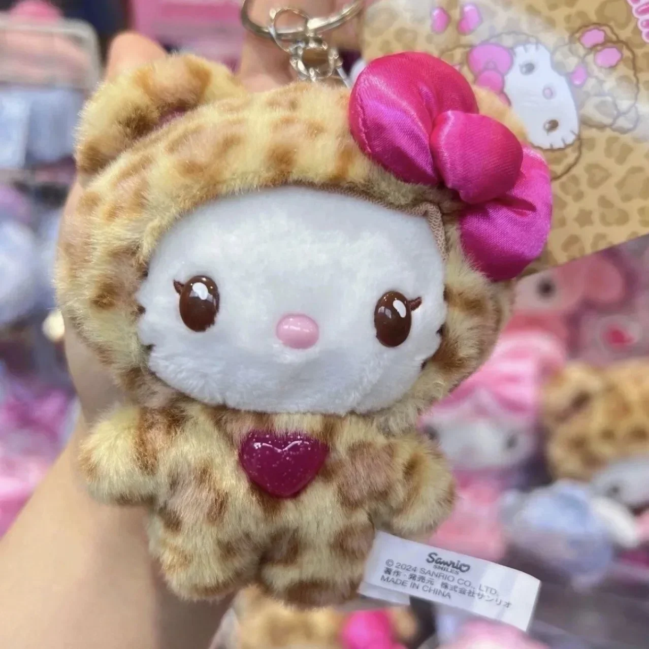 Sanrio hello kitty leopardo impressão boneca de pelúcia dos desenhos animados mochila pingente decoração menina bonito chaveiro pendurado ornamentos brinquedo presentes