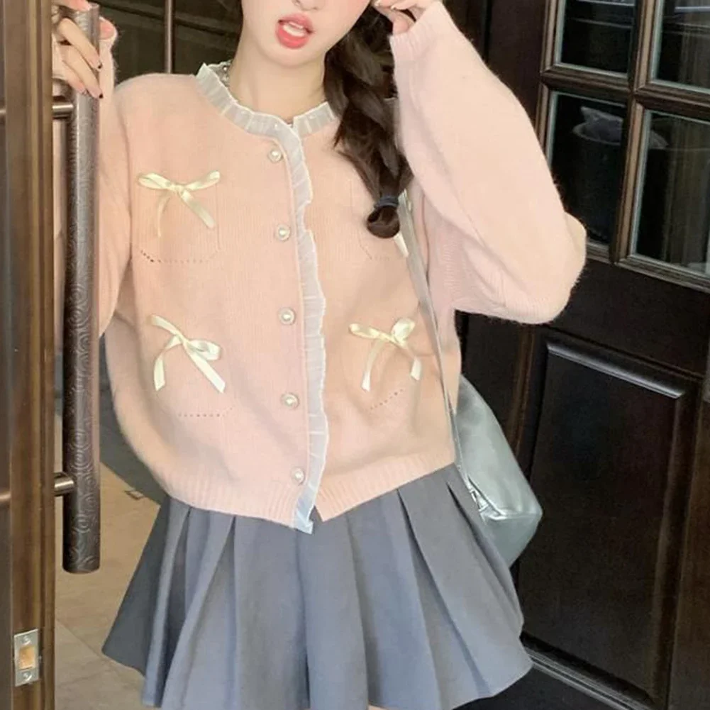 

Trendy long sleeve pink knitted cardigan showcasing lovely bow lace embellishments perfect club attire For Women