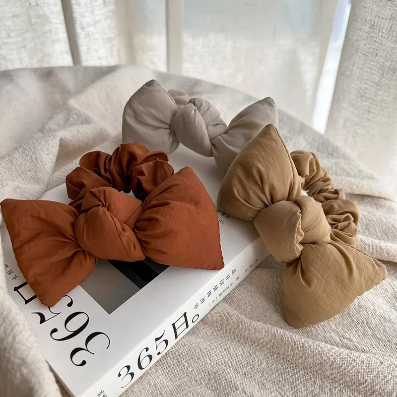 

Autumn and winter sponge three-dimensional bow large intestine hair band Korean women's headband large intestine ring