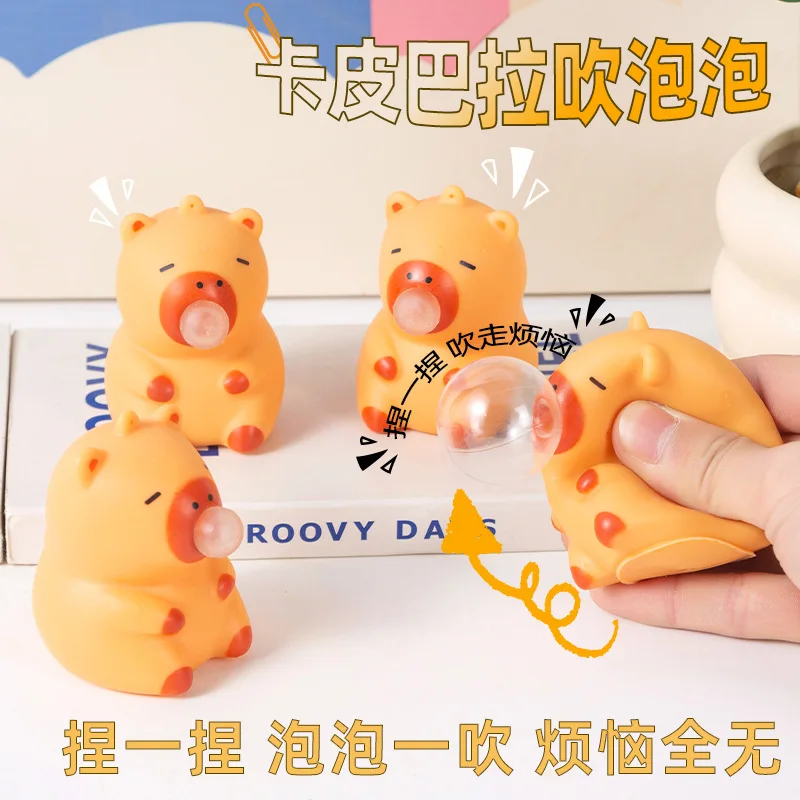 

New Kapibara spit bubble capybara pinch music children's creative decompression and decompression toy schoolbag pendant wholesale