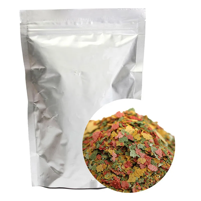 Alimento para peces Ornamental tropicales, accesorio para acuario, 100g, para peces pequeños, nutritivo, láminas de 3 colores