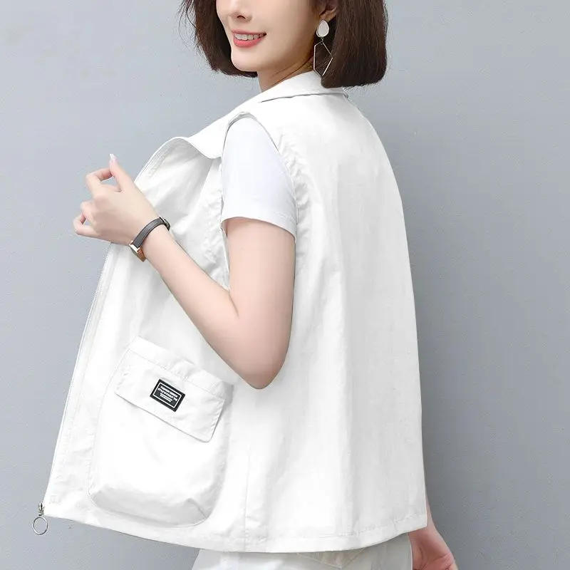 Fashion Lapel Spliced Pockets Zipper Sleeveless Shirt Women's Clothing 2023 Summer New Oversized Casual Tops All-match Blouse