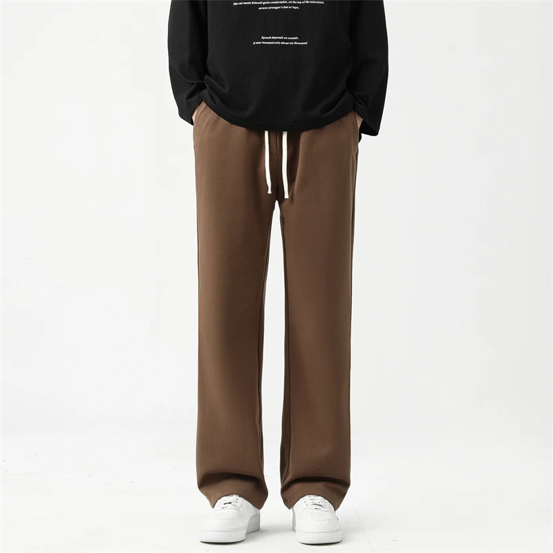 

Autumn and winter men's sports pants Korean fashion thick warm wide leg straight tube loose men's casual warm velvet pants