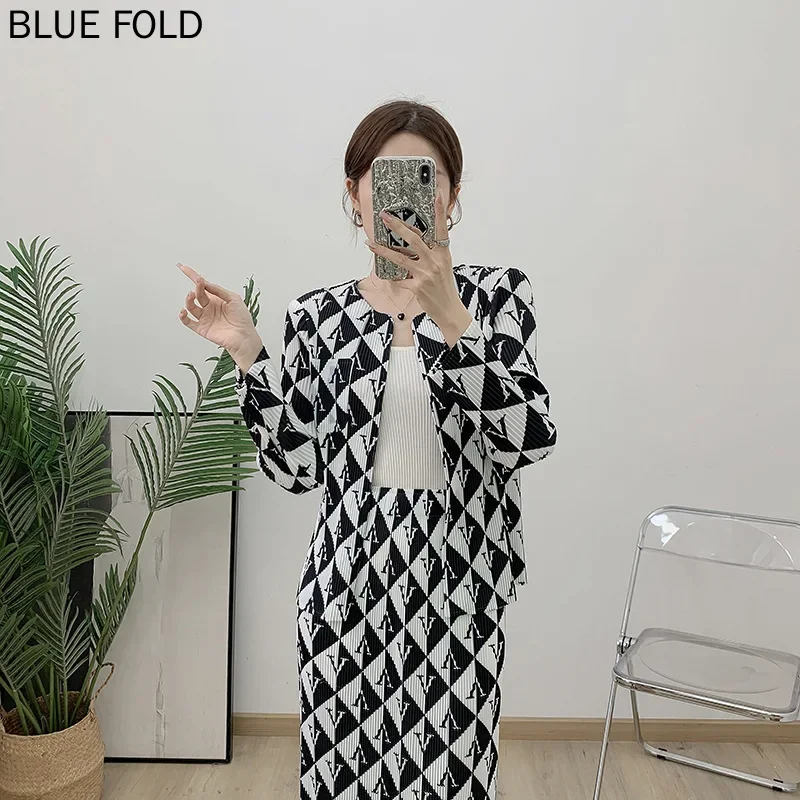 MIYAKE PLEATS Inverno Nuovo Cappotto stampato + Gonna a pieghe Abito sciolto Gonna dritta a pieghe di grandi dimensioni Set di due pezzi Set di gonne