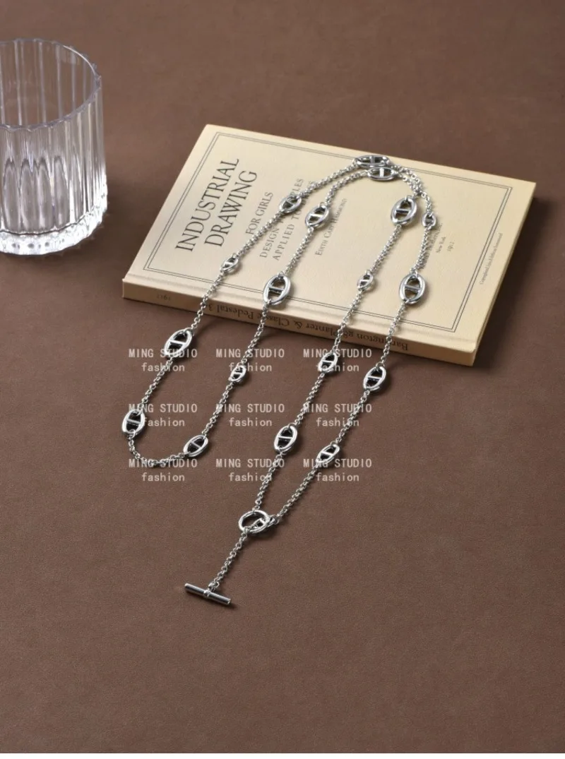 

Silver long pig nose necklace French light luxury niche high-end OT buckle one multi-wear sweater chain