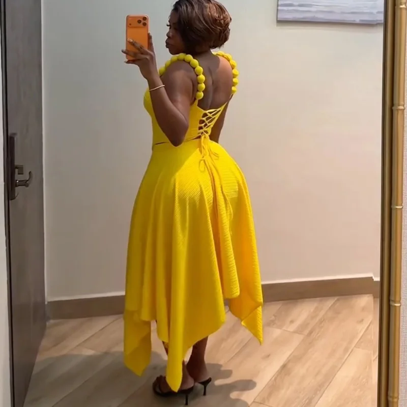Nueva moda africana, conjunto de 2 piezas para mujer, Top corto con cordones en la espalda y falda larga Irregular, traje, trajes de vacaciones