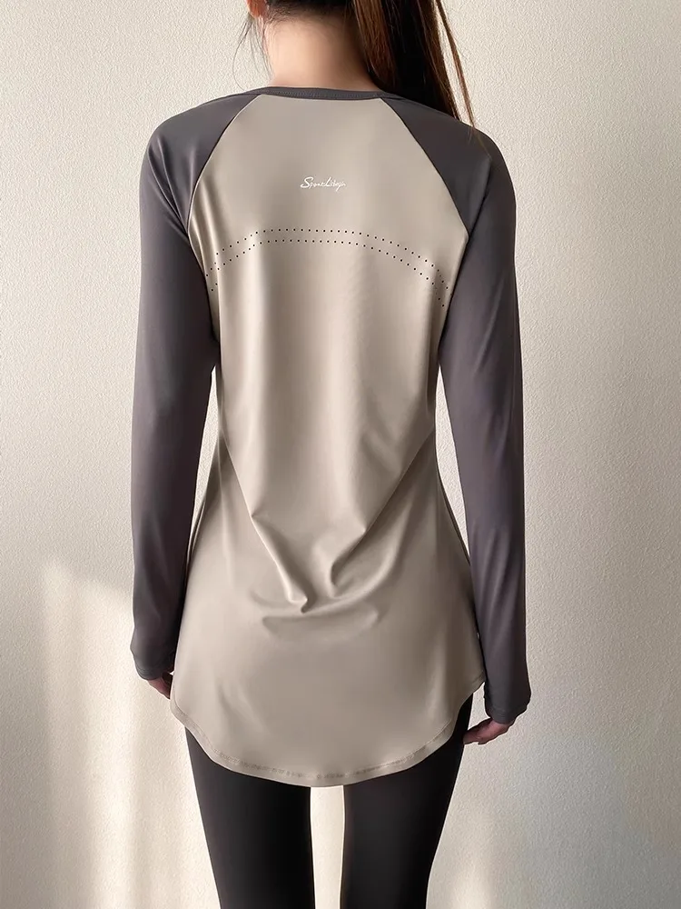 

Trendy Yoga Sportswear Long Sve Top Summer Qui Dry Fitn Women's T-irt Cover Butt Waist a Regular Length Polye...