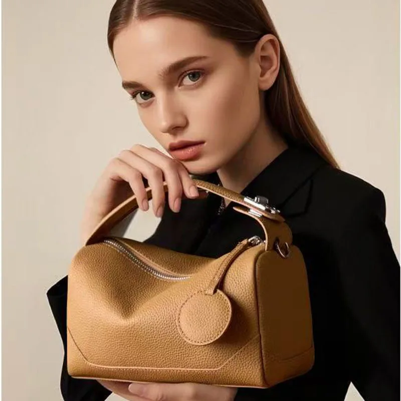 2026 new genuine leather solid color zipper design handbag multifunctional commuting simple crossbody bag