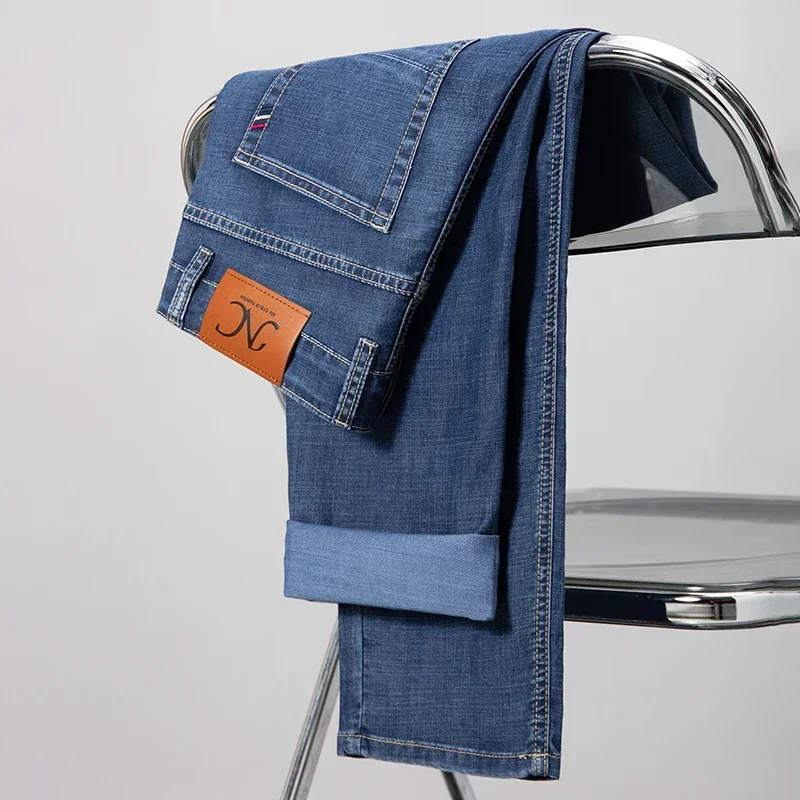 Hochwertige 2026 Dünne Lyocell-Jeans für Herren Klassische Lockere Business-Casual Denim-Hose Schwarz Blau Herrenhose Weich Fallend