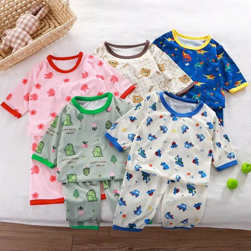 

2024 New Kids Summer Casual Pajamas Boys Girls Cartoon Three-quarter Sleeve T-shirt Tops + Pants Clothing Sets Baby Loungewear