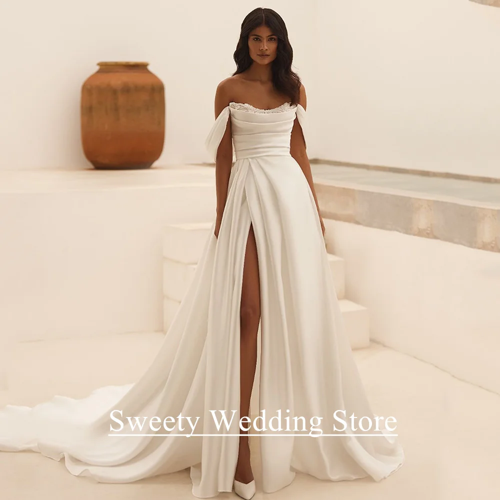 Maßgeschneidertes Hochzeitskleid, elegant, schulterfrei, mit Falten, Körper, Perlenapplikation, hoher Schlitz, A-Linie, Satin-Brautkleid für die Braut der Frau