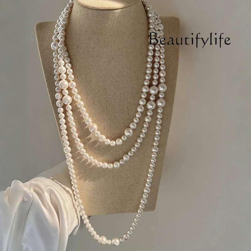 Premium temperament pearl necklace Long light luxury French autumn and winter sweater chain stacked with multiple layers