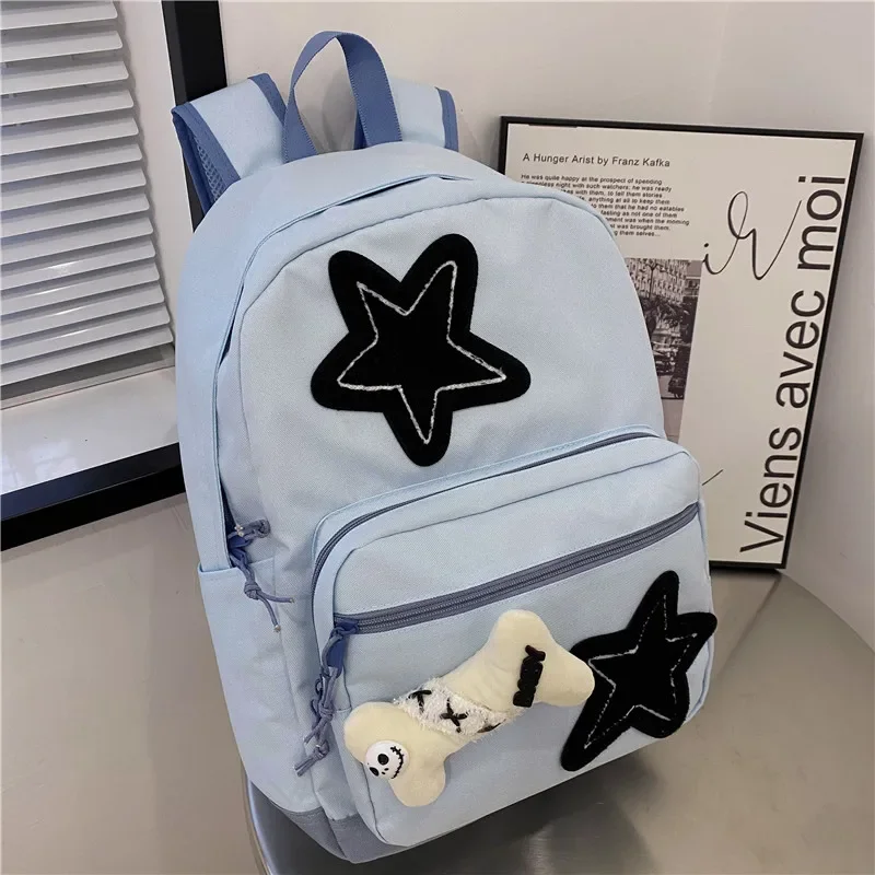 2025 Oxford Textile Solid Color Zipper Star Pattern Hot Selling Backpack Soft Handle Air Cushion Strap College Style School Bag