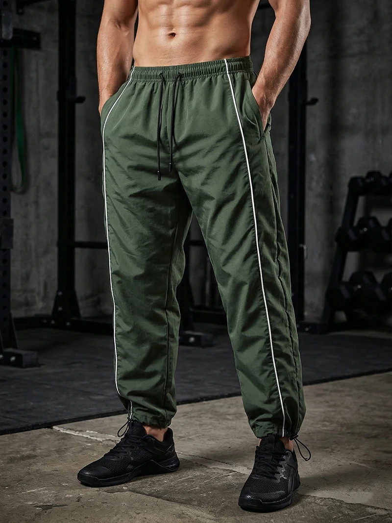 Trendige, sportliche Herrenhose mit Linien, Fitnessstudio, Workout, Laufhose mit Seitentaschen, sportliche, schnell trocknende, atmungsaktive Jogginghose – Detail 24