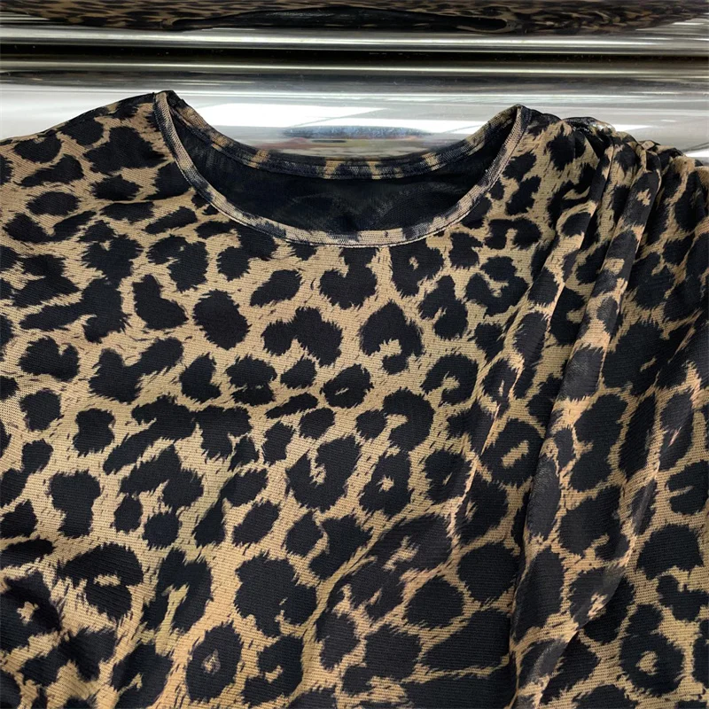 Abito da donna 2026 Primavera nuovo mini abito elastico Stampa leopardata girocollo abito corto Abiti da festa con abito avvolgente sui fianchi irregolari