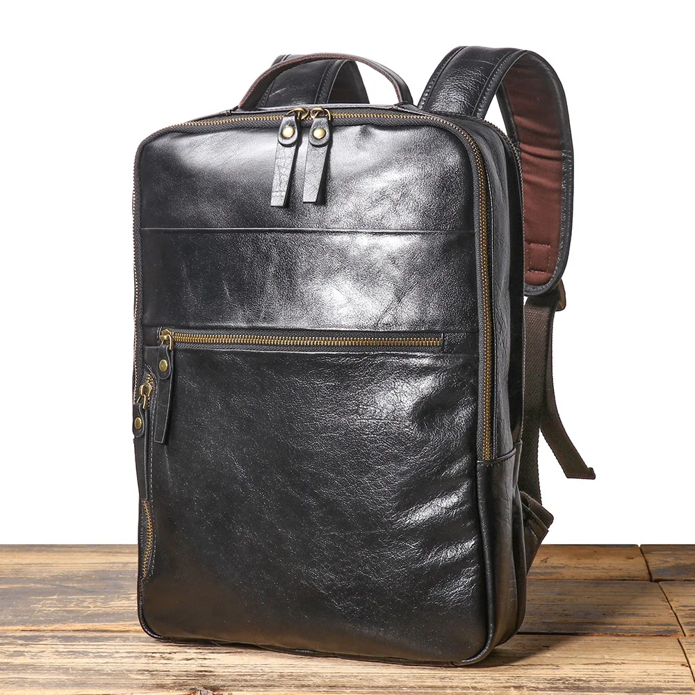 

Genuine Leather Men's Backpack with Large Capacity and Laptop Compartment