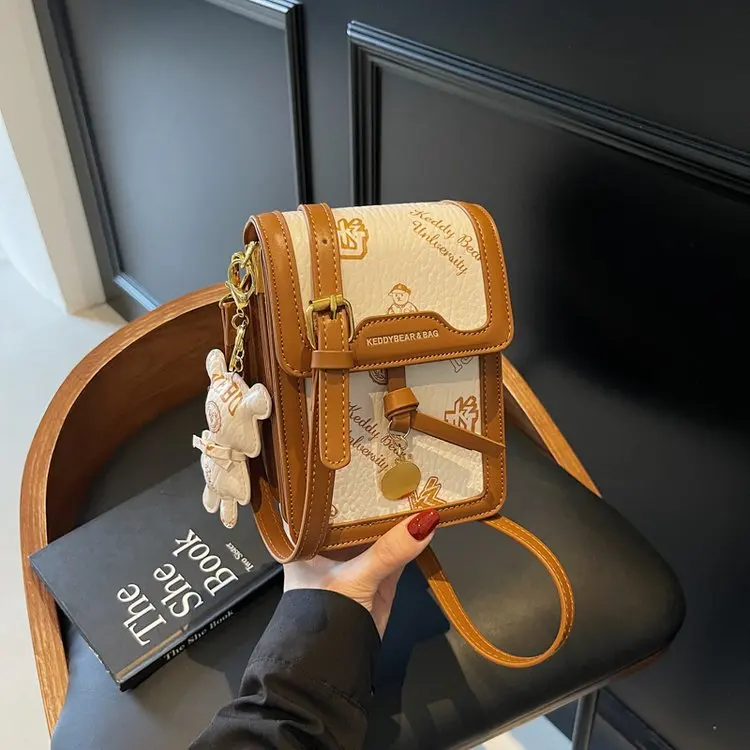 

2025 Новинка! Нишевая и универсальная женская сумка для мобильного телефона. Повседневный простой маленький квадратный дизайн, идеальная маленькая сумка через плечо