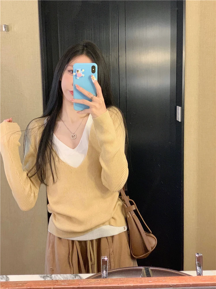 

Spring 2026 Loose V-ne Long Sve Knitted Top Women's Faion Casual Sle Color Blo Design Versatile Comfortable Knitwear