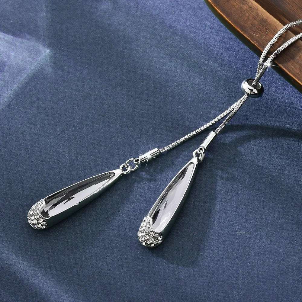

2025 Long drawstring necklace for autumn and winter, crystal sweater chain, feminine charm, teardrop-shaped necklace