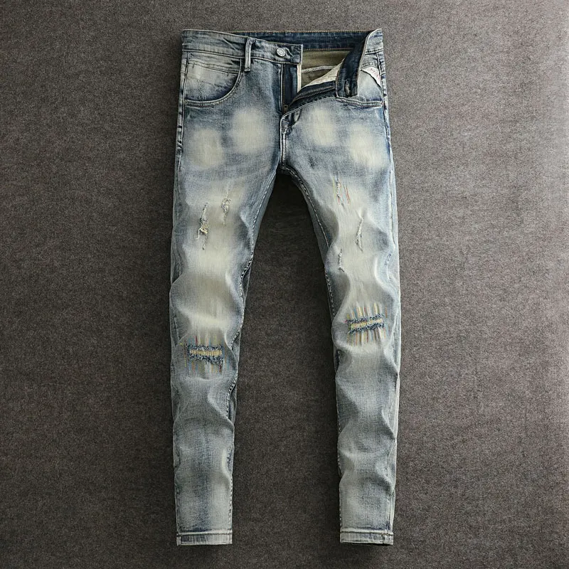 Jeans da uomo di moda di strada Jeans strappati Slim Fit elasticizzati blu lavati retrò da uomo ricami pantaloni in Denim Vintage firmati con patch