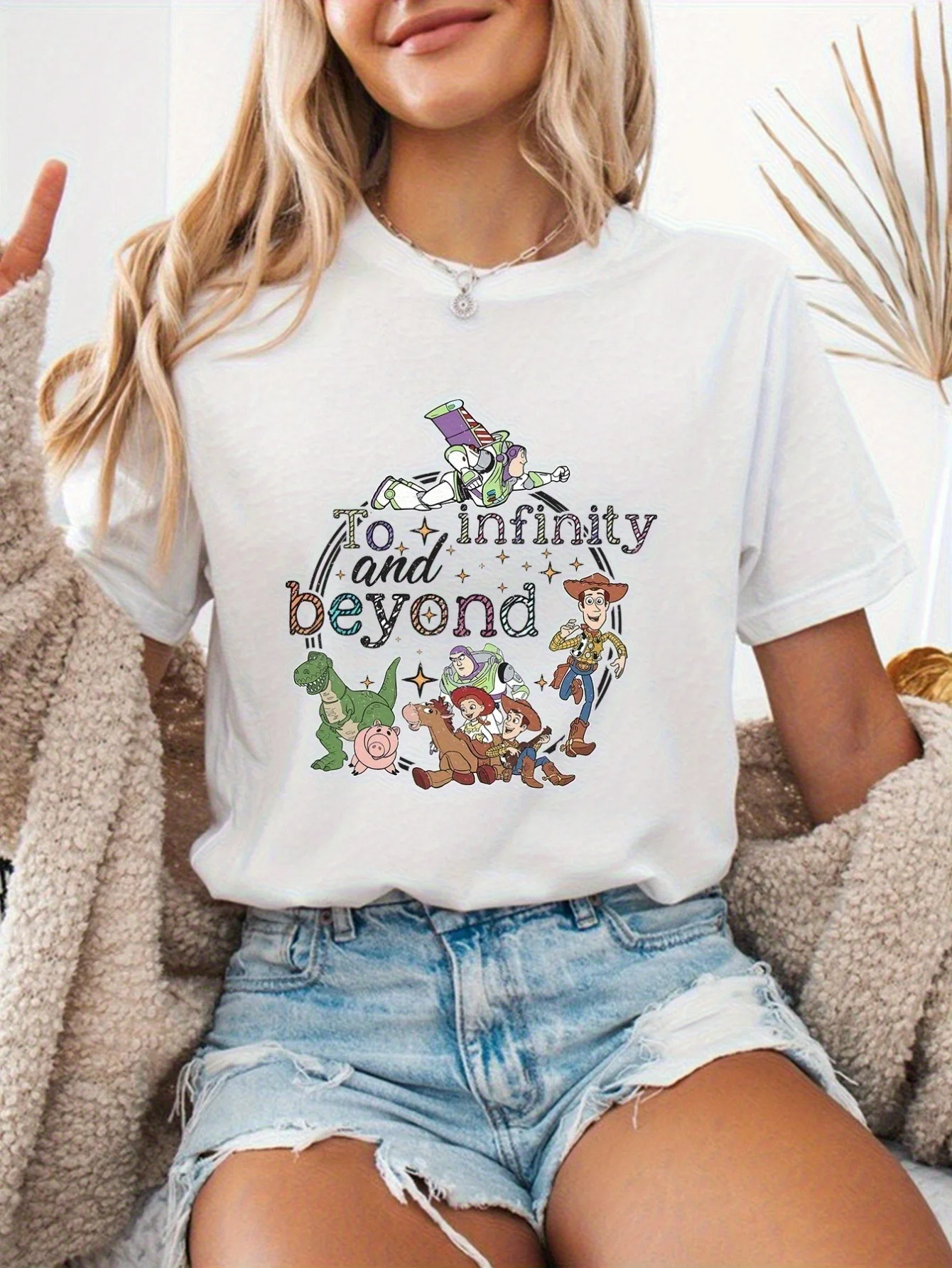 تي شيرت نسائي مرخص من Disney: تي شيرت برسومات Infinity and Beyond - طباعة كرتونية مشرقة مع Woody & Buzz Lightyear #1