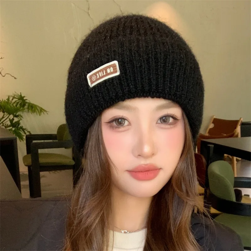 

Japanese-style internet-famous pure-color and color-mixed woolen hat for ladies, trendy, simple, windproof and ear-protecting