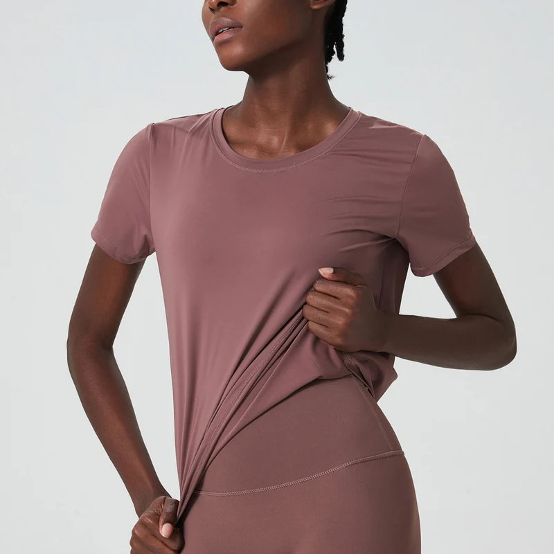 Camiseta de manga corta de Yoga para mujer, blusa suave de Color sólido, ligera y transpirable de secado rápido para gimnasio y correr, Verano