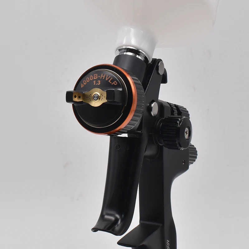 Pistola a spruzzo HVLP 4000B di alta qualità 1.3mm Spruzzatore professionale Vernice Aerografo Riparazione Pistola a vernice spray Aerografo per la verniciatura di auto