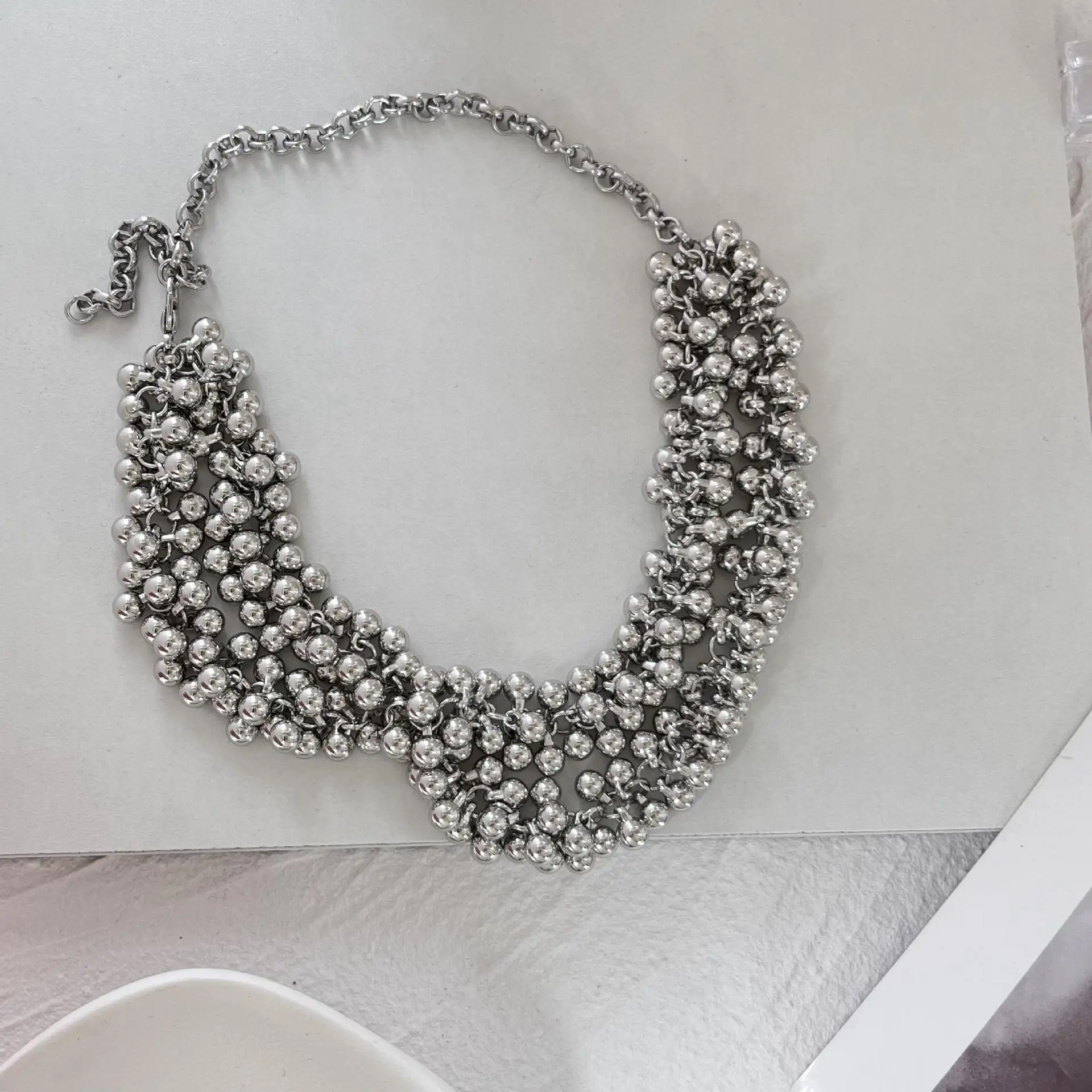 Fashionable and exaggerated silver multi-layer metal ball necklace, women's high-end feeling wrapped neck chain gift party