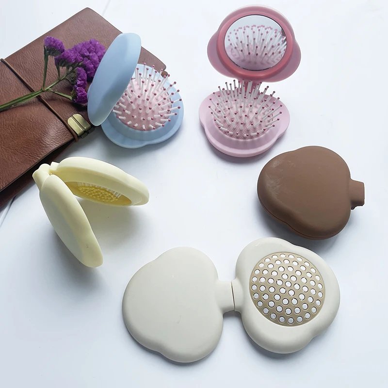 مشط شعر صغير محمول مع مرآة لصالونات تصفيف الشعر، فرشاة شعر صغيرة الحجم قابلة للطي للتدليك 2 في 1، مشط وسادة هوائية