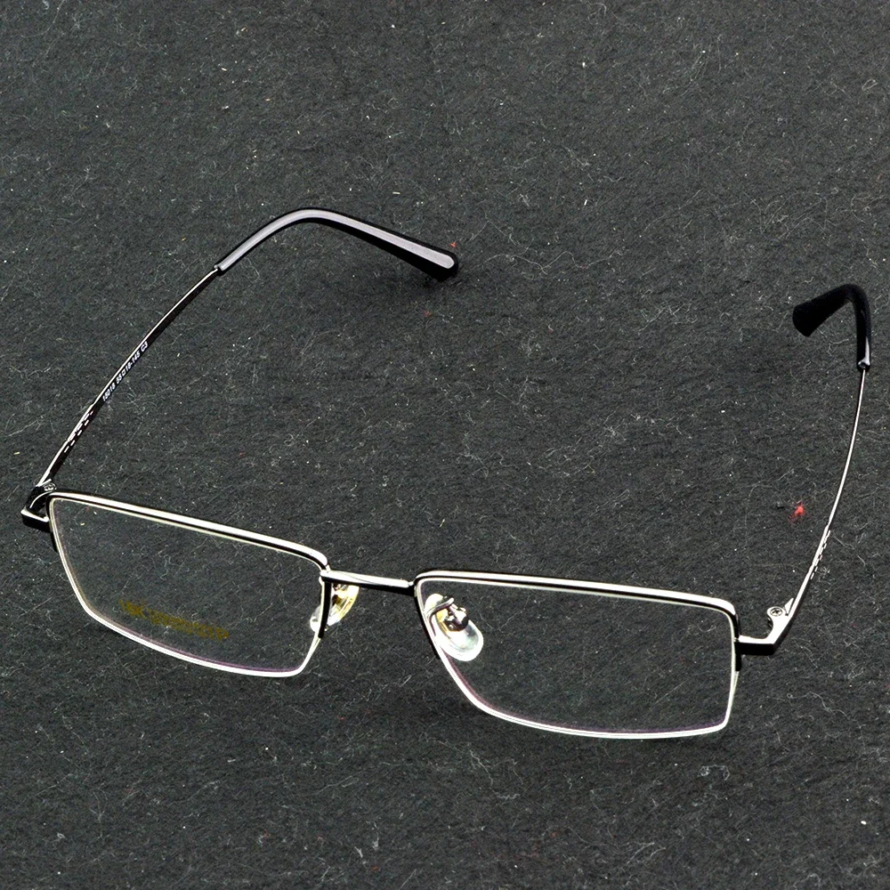 

Серебряные прямоугольные очки для чтения в титановой оправе с фиолетово-зелеными отражающими линзами и черными дужками, диоптрии от +0.75 до +4