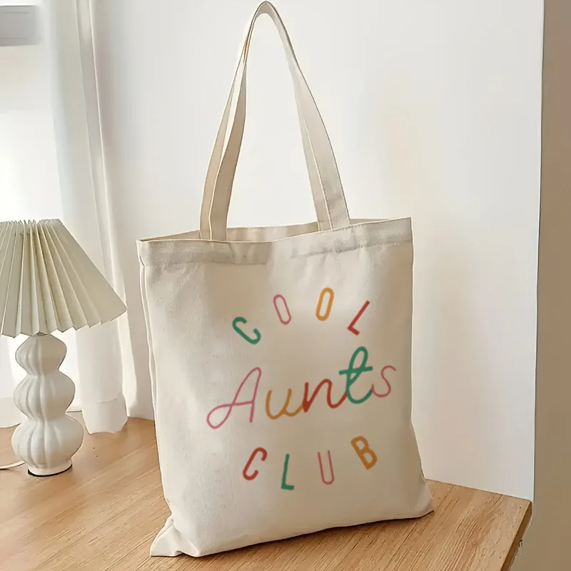 A Cool Aunt Club printed canvas tote bag, suitable for daily